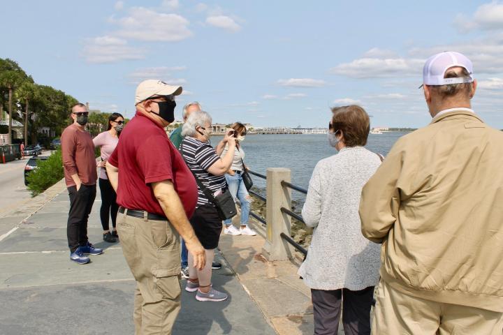 a group of people that are talking to each other