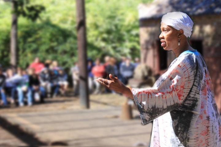 a person standing on a sidewalk