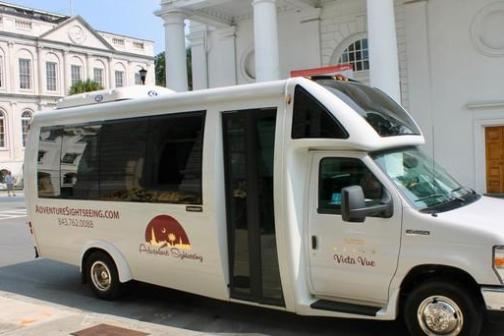 a van parked on the side of a building
