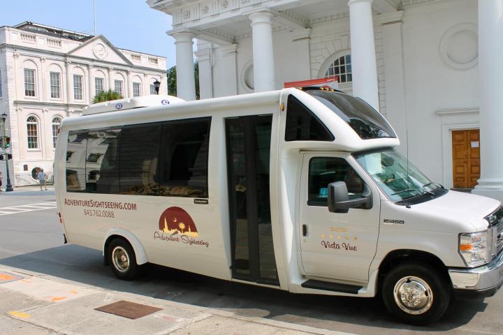 a van parked on the side of a building